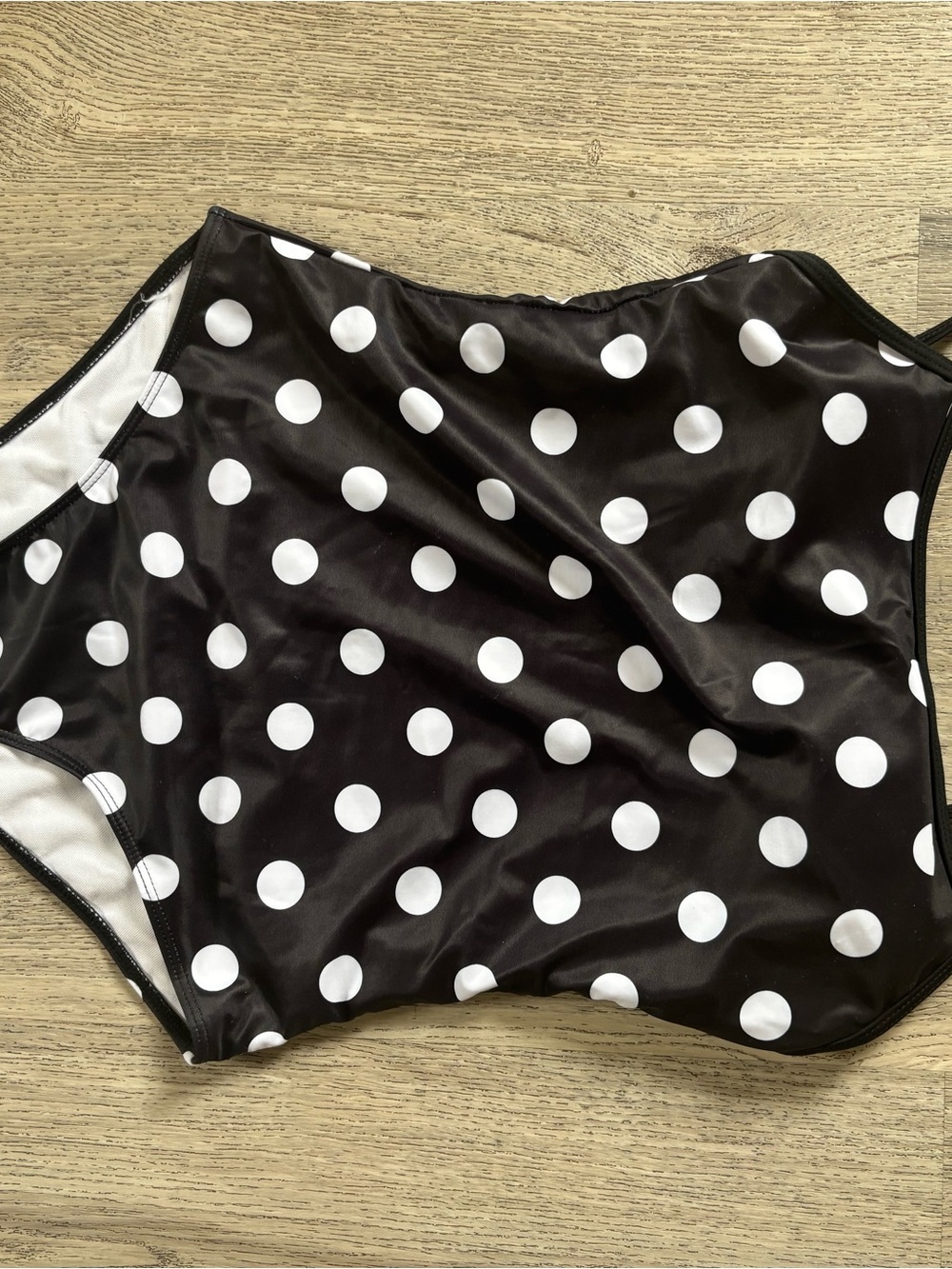 Women’s Black & White Polka Dot one piece swim suit. Never been worn.